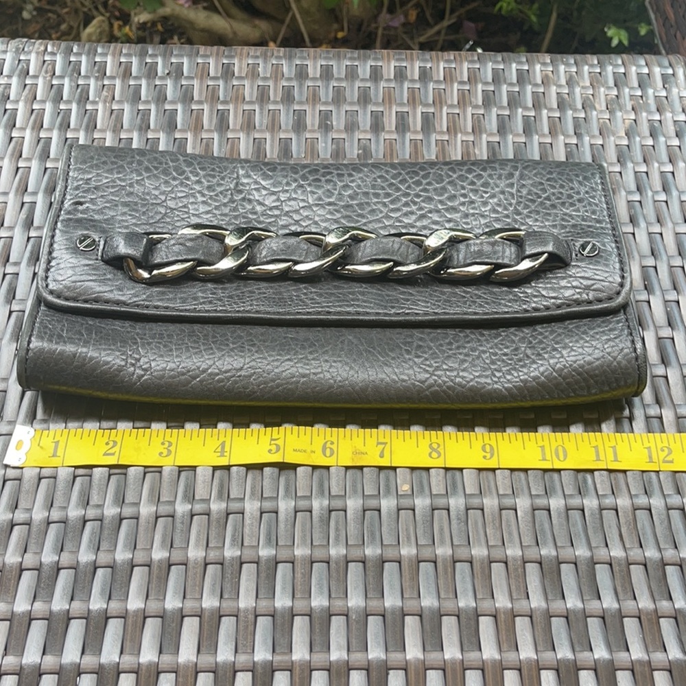 Michael kors Pebbled leather MK clutch with gun metal zipper. - Picture 14 of 16